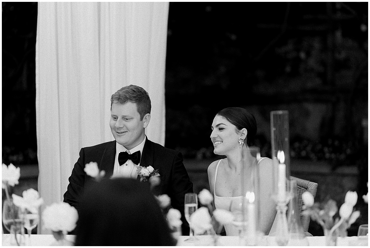 bride and groom at table