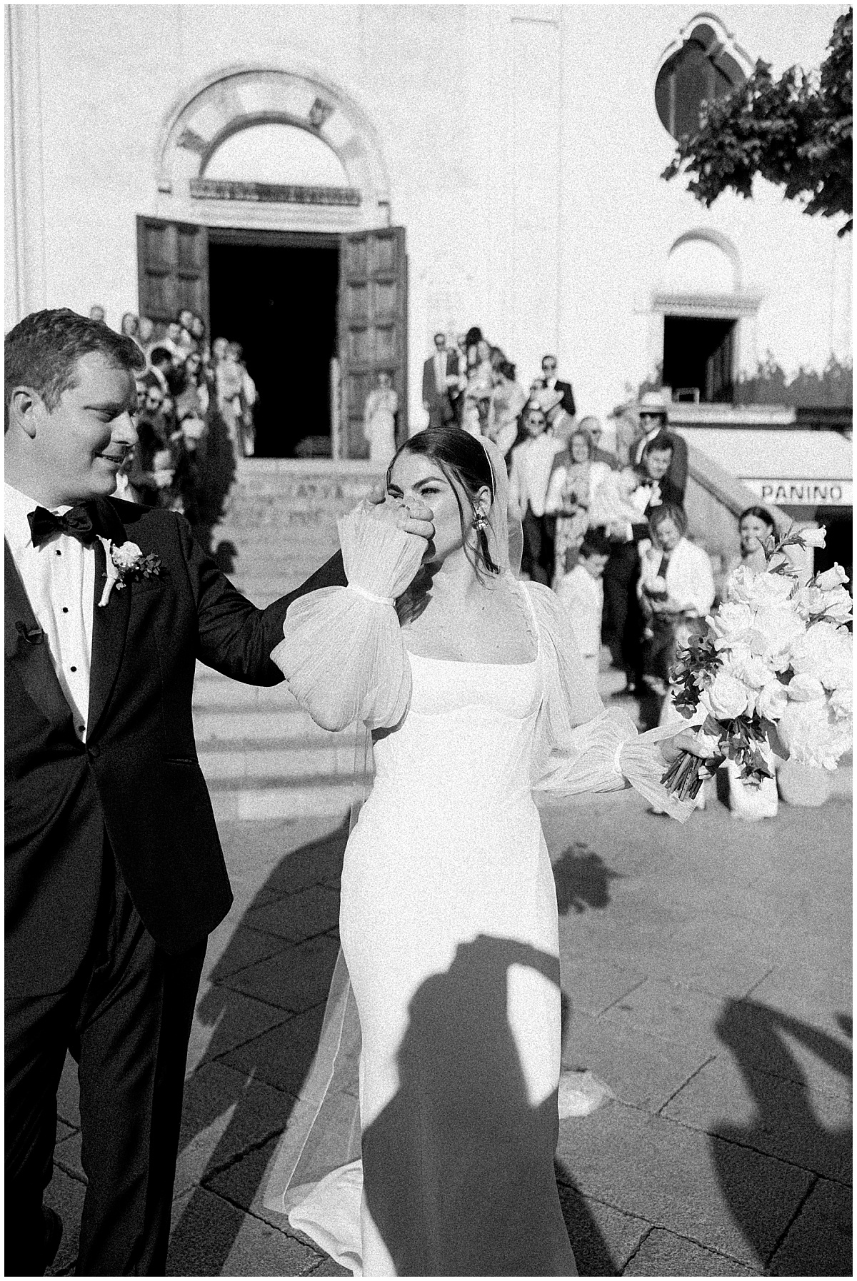 bride kissing grooms hand