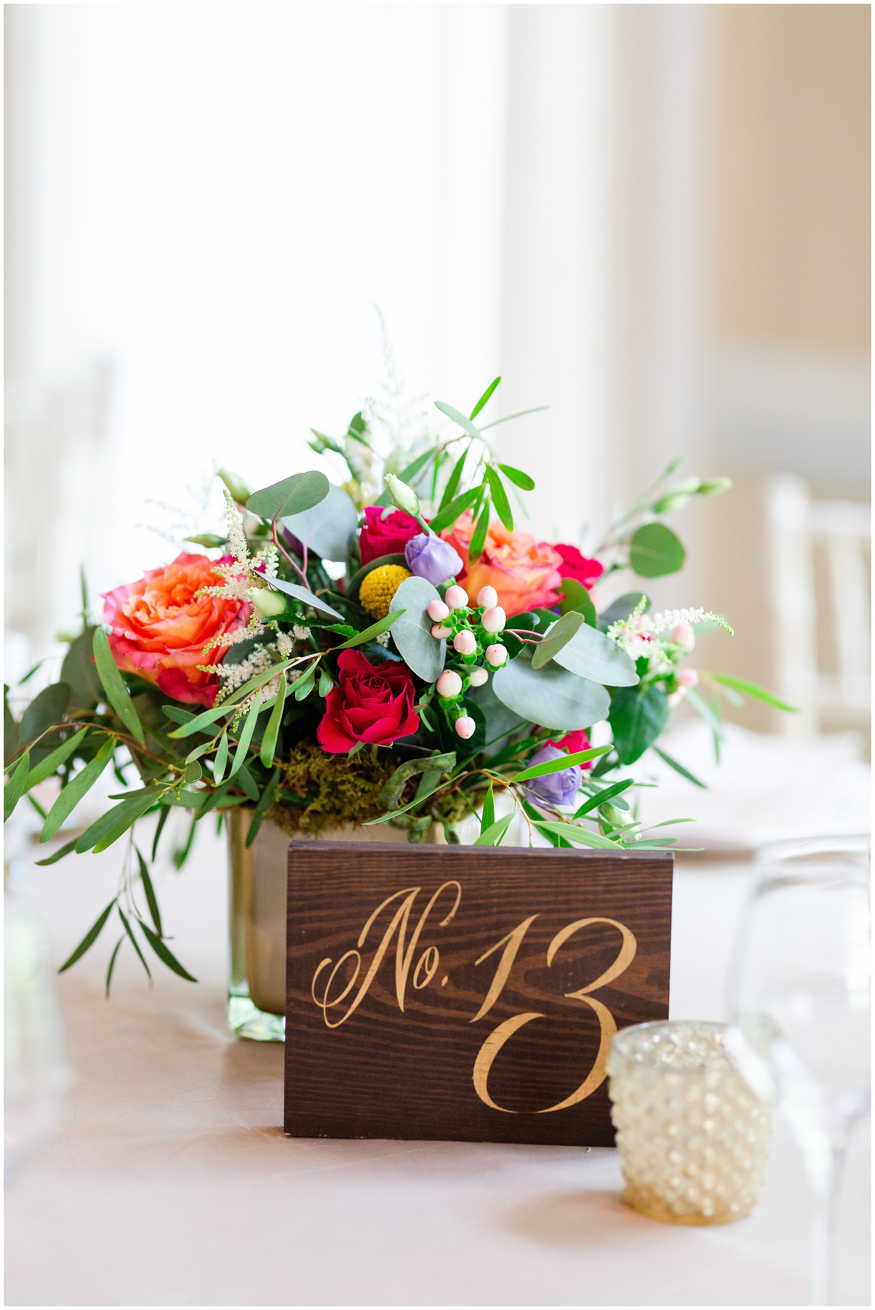 Colorful centerpieces for wedding. Luke and Ashley Photography
