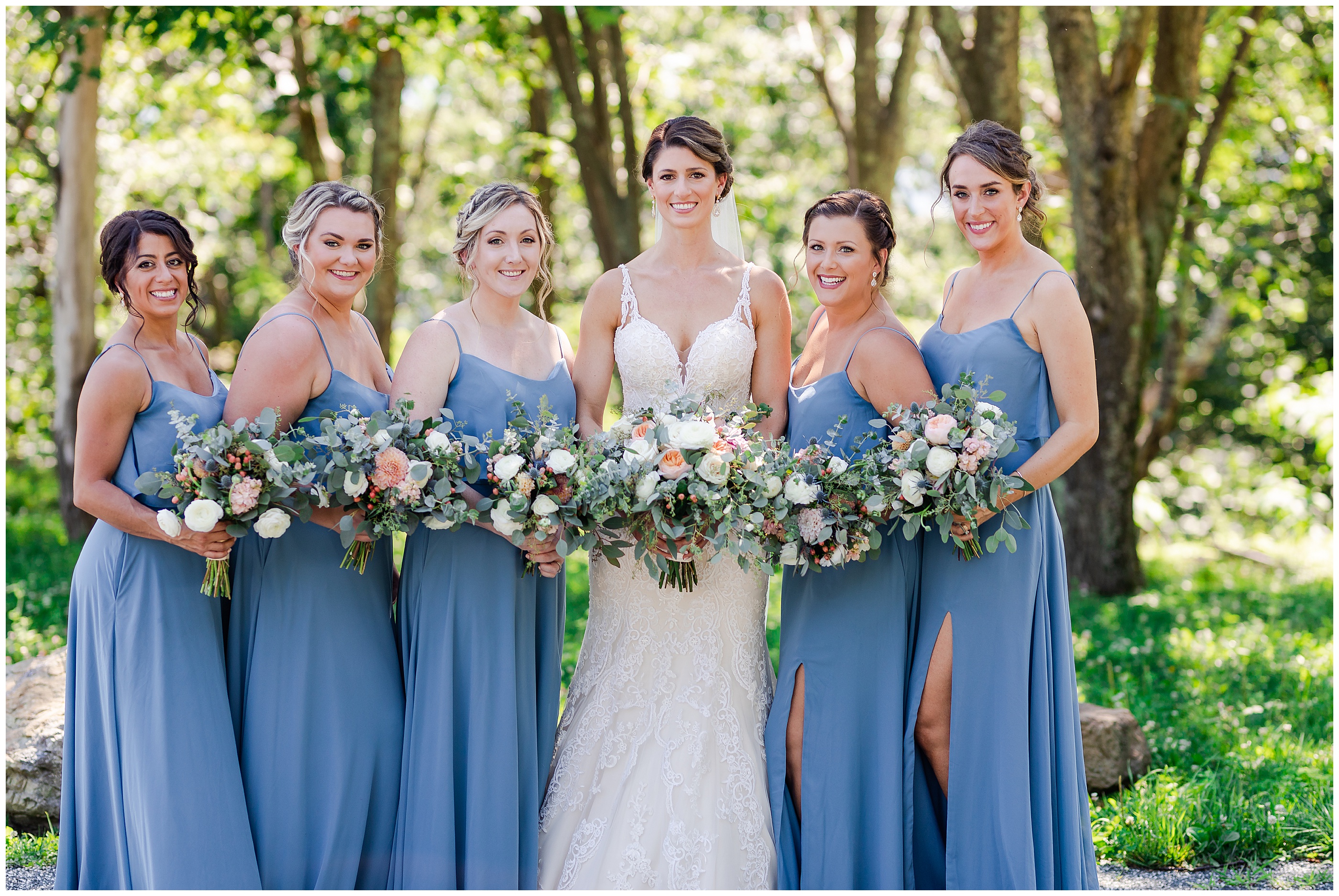 Bridesmaids with Bride in Blue Bridesmaid dresses Luke and Ashley Photography 