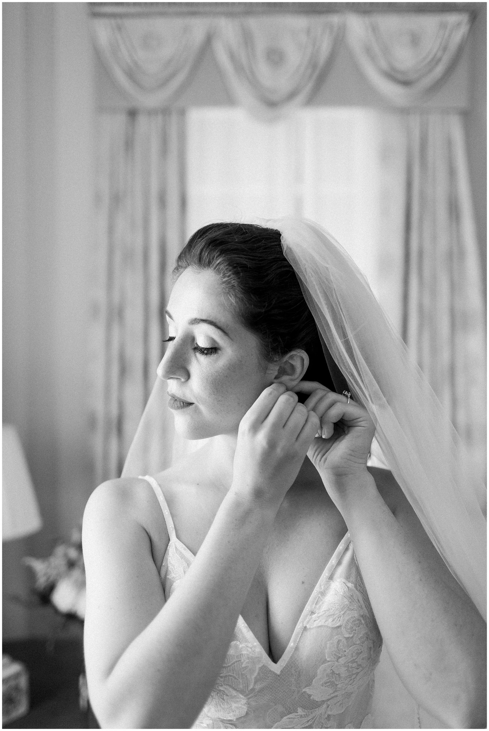 bride getting ready at the Williamsburg Inn Luke and Ashley Photography 